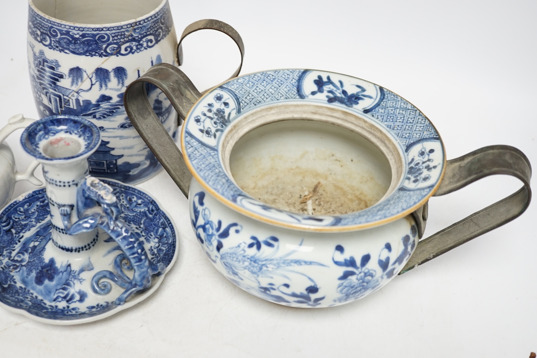 A group of five 18th century Chinese export ceramics to include a rare blue and white ‘dragon’ chamberstick, tallest 16cm. Condition - poor